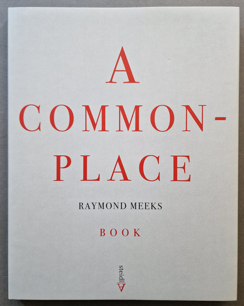 The front cover of the book 'A Common Place' by Raymond Meeks, featuring a minimalist off-white cover with bold red serif title text and black author text, published by Steidl.