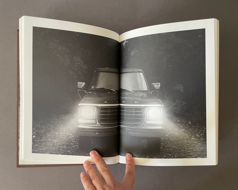 Black and white image of a truck.