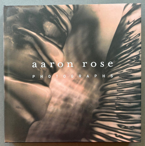 Book titled 'Aaron Rose: Photographs' by Alfred Corn with a cover featuring an image from the content of the book.