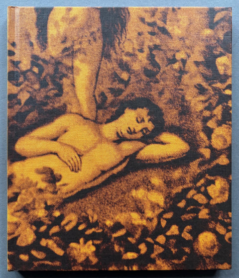 Book titled 'Passacor' with an orange and black cover featuring a depiction of a naked man lying on the ground and a woman standing nearby.