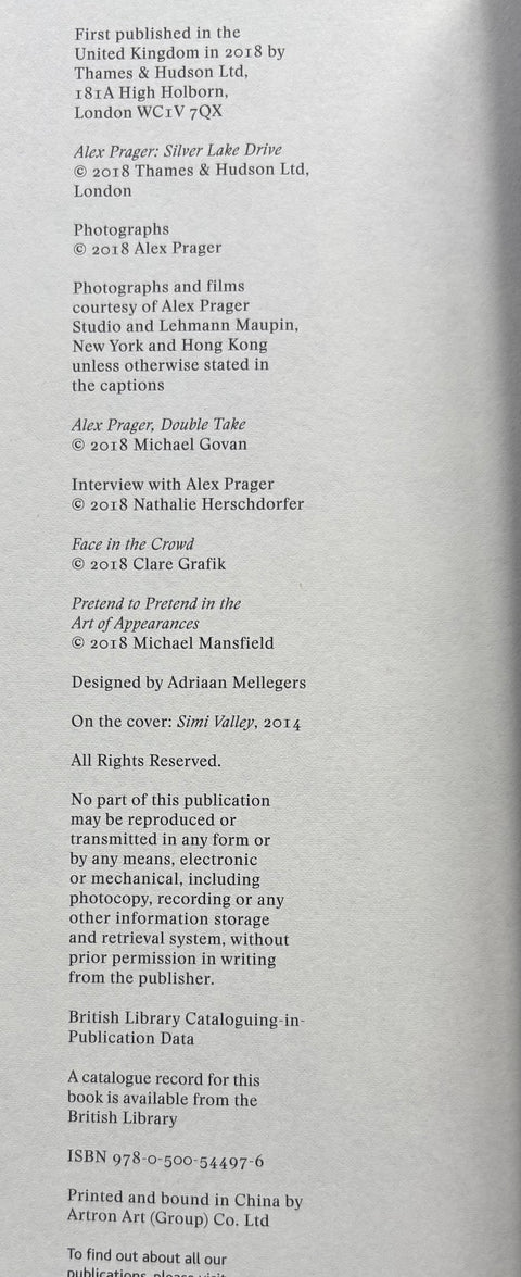 A photographed book interior page showing printed publication details, copyright text, credits, and publisher information on a white page.