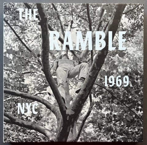 Book titled 'The Ramble: NYC 1969' by Arthur Tress with a cover featuring a black and white image of a man in a tree.