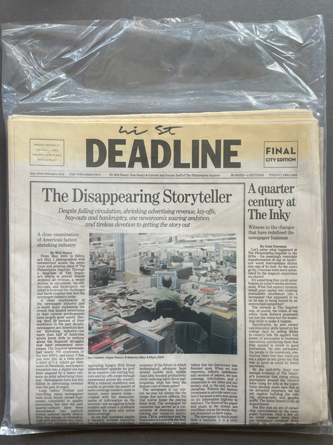 A vintage-style newspaper titled DEADLINE with cream paper and black text, sealed inside a clear plastic bag against a dark gray background.