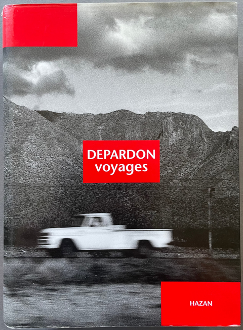 A book titled 'DEPARDON voyages' by Hazan, featuring a black and white photograph of a vintage white pickup truck on a road with mountains in the background, accented by solid red blocks on the cover.
