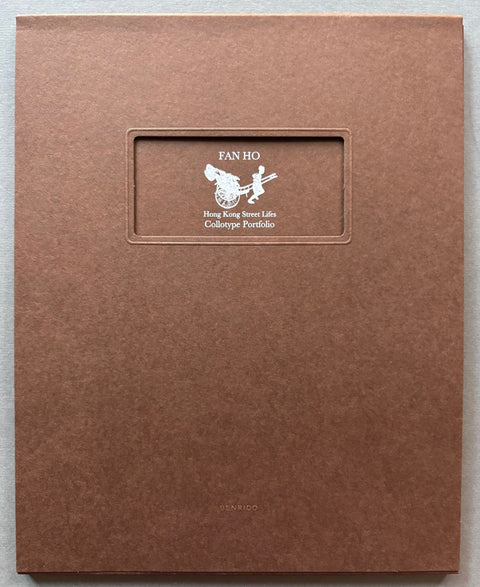 Book titled 'Hong Kong Street Lifes' by Fan Ho with a brown cover.