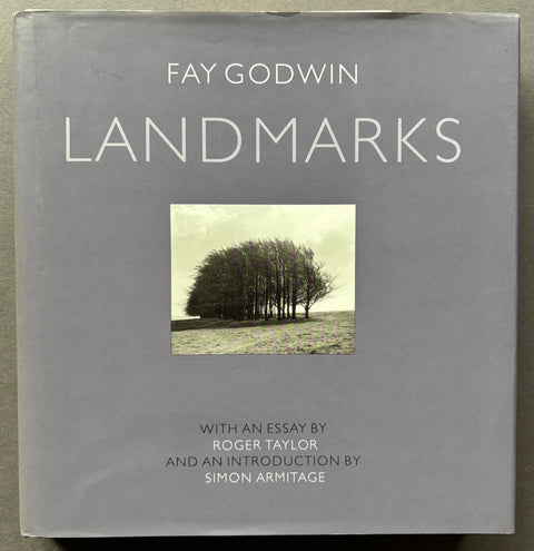 Book titled 'Landmarks: A Survey' by Fay Godwin with a grey cover featuring the image of a group of trees.