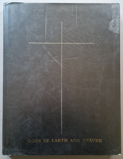 A hardcover book titled 'Gods of Earth and Heaven' with a black cover featuring a simple gold cross and gold lettering at the bottom.