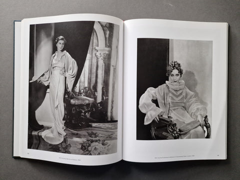 An open book spread showing two fashion portraits.