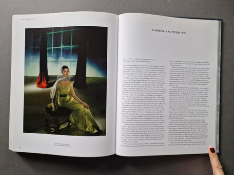 AN open book spread with text on the right page and a colour fashion portrait of a woman on the left