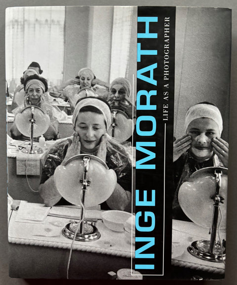 Book titled 'Life As A Photographer' by Inge Morath with a cover featuring an image of several women sitting at dressing tables.
