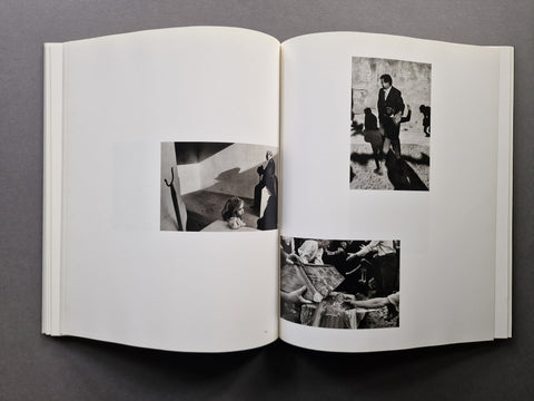 An open book spread showing three photographs in black and white.