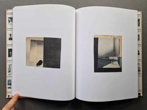 An open book with small square black-and-white photographic collages