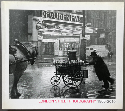 Front cover of London street photography 1860-2010 with a black and white image of a cart and horse in London.