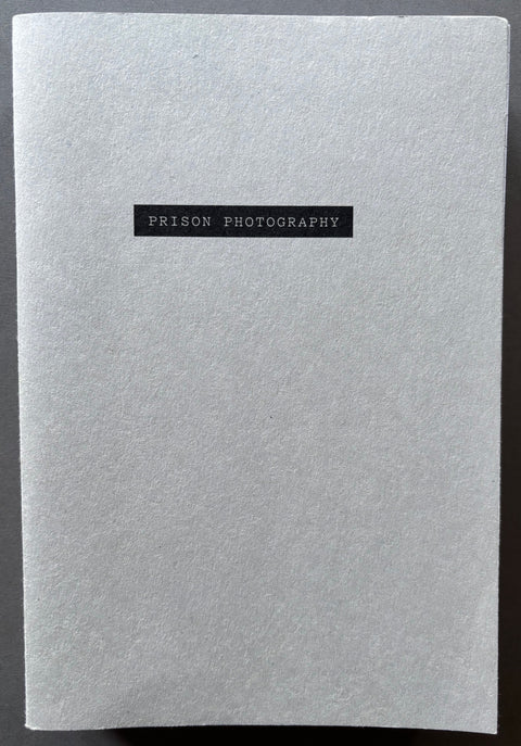 Book titled 'Prison Photography' by Nicolo Degiorgis with a grey cover.