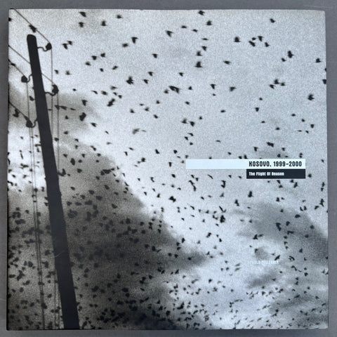 Book titled 'Kosovo. 1999-2000: The Flight of Reason' with a cover featuring numerous birds in flight.