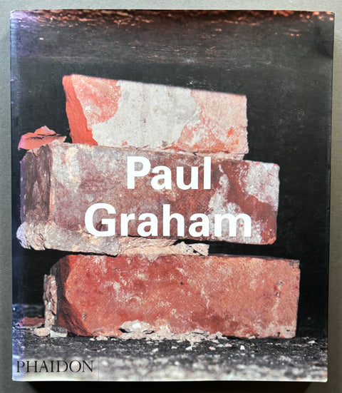 Book titled 'Paul Graham' with a black cover featuring a pile of bricks.