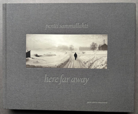 Book titled 'Here Far Away' by Pentti Sammallahti with a grey cover showing the image of a person walking along a snow covered road.