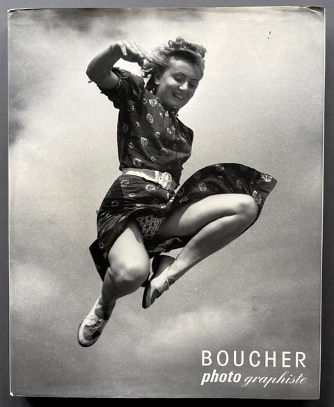 Book titled 'Boucher: Photo Graphiste' by Pierre Boucher with a cover featuring the black and white image of a woman leaping into the air.