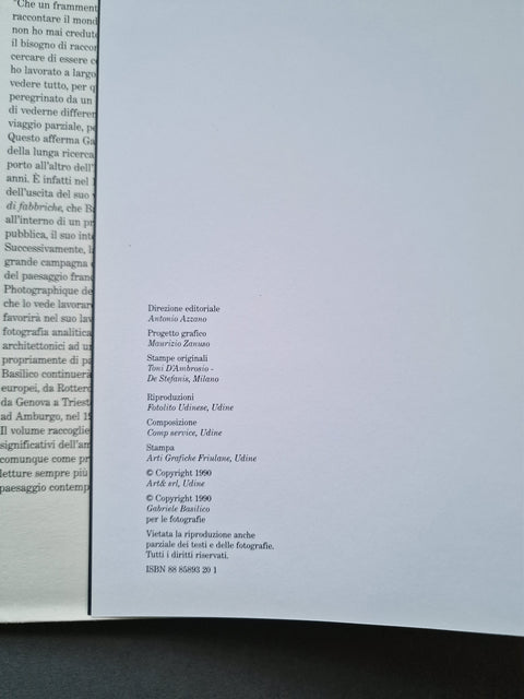 A close-up of a printed book or booklet page with Italian text, photographed on a dark surface. The page includes publisher credits and an ISBN at the bottom.