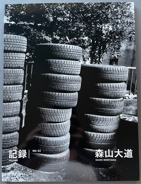 Front cover of Record No.53 by Daido Moriyama with a black and white image of tires.