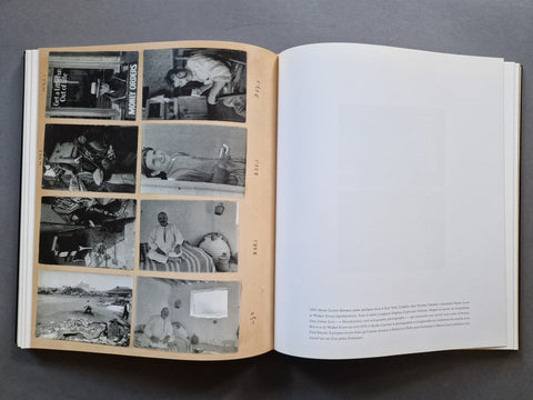 An open book, showing a left page with nine black-and-white photographs and a right page with a large blank white area and small text at the bottom.