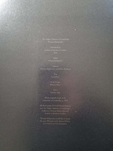 The copyright page of a book, featuring white printed text on a dark charcoal gray background.