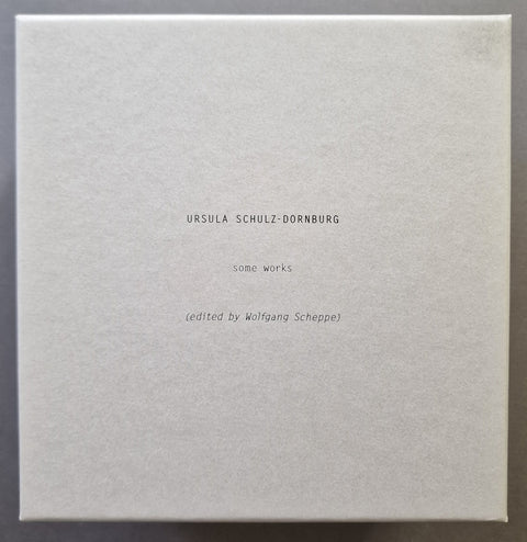 The front panel of the limited edition box set with the following text 'URSULA SCHULZ-DORNBURG', 'somo works', and '(edited by Wolfgang Scheppe)' in a small, centered, black typewriter font against a textured off-white background.