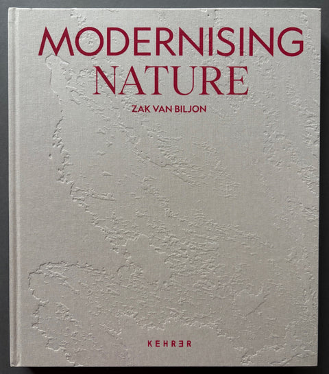 Book titled 'Modernising Nature' by Zak van Biljon with a grey embossed cover featuring red type.