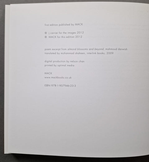 A close-up of a book's printed title and publication details page, showing text for 'first edition published by MACK' and copyright information for 'carrie for the images 2012' and 'MACK for this edition 2012'.