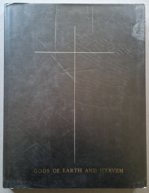 A hardcover book titled 'Gods of Earth and Heaven' with a black cover featuring a simple gold cross and gold lettering at the bottom.