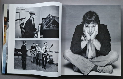 An open book spread showing black-and-white photographs of a seated man in a dark jacket and jeans, with smaller inset photos of a man playing a piano and standing with musical instruments.