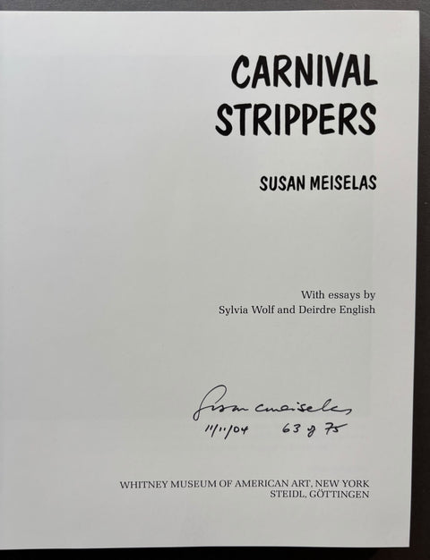 A white printed cover or document with black text reading 'CARNIVAL STRIPPER' and 'SUSAN MEISELAS,' plus smaller essay credits and a handwritten signature near the bottom.