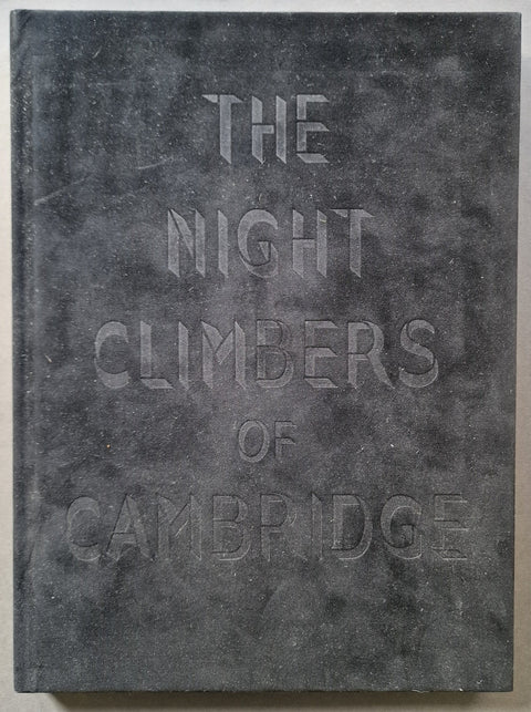 A hardcover book titled 'THE NIGHT CLIMBERS OF CAMBRIDGE' with embossed lettering on a black velvet cover