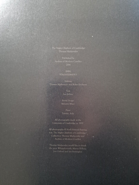 The copyright page of a book, featuring white printed text on a dark charcoal gray background.