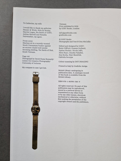 The copyright page contains columns of text, and a coloured photo of a handwatch.