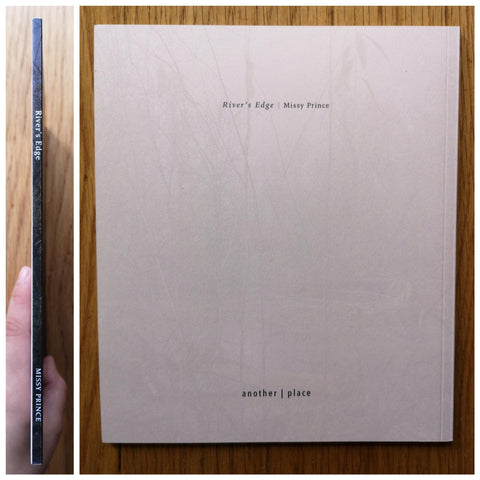 The photography book cover of River's Edge by Missy Prince. In softcover with a lake and a forest.