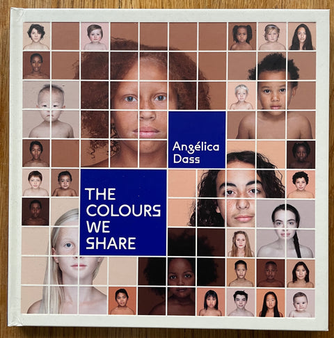 The phootgraphy book cover of The Colours We Share by Angelica Dass. In hardcover with portraits of people.