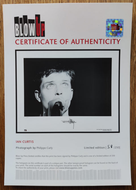 The phootgraphy print of Ian Curtis by Philippe Carly. Signed by Carly and accompanied by a certificate of authenticity.