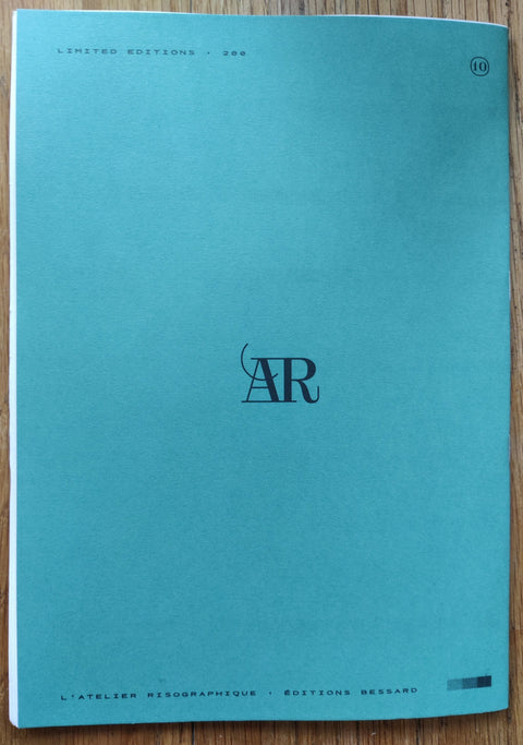 The photography book cover of Stuck (L’Atelier RisoGraphique 10) by Cloro. In softcover green.