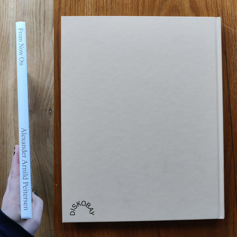 The photography book cover of From Now On by Alexander Arnild Peitersen. In hardcover beige.
