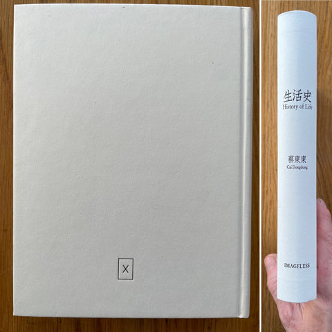 The photography book cover of History of Life by Cai Dongdong. In hardcover white.