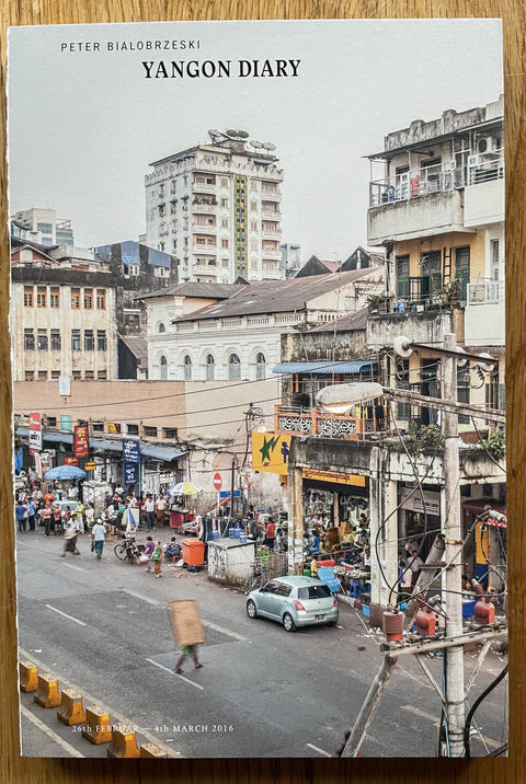 This is the cover of Yangon Diary by Peter Bialobrzeski with a city image on the cover