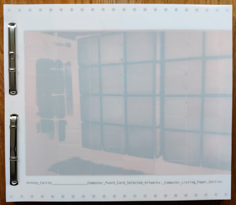 The photobook cover of Computer Punch Card Selected Artworks by Antony Cairns. Signed.