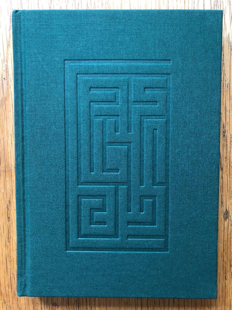 The photography book cover of Back to Nowhere by Charalampos Kydonakis aka dirtyharrry. Hardback in turquoise. Signed.