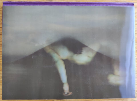 The photobook cover of Bill Henson. Comes with a signed print.