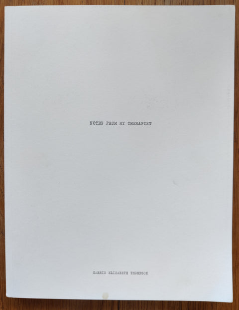 The photography book cover of Notes From My Therapist Carrie Elizabeth Thompson. In softcover white.
