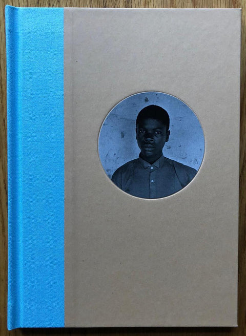 The photography book cover of Africa: Gems and Jewels. Hardback with blue binding. Signed.