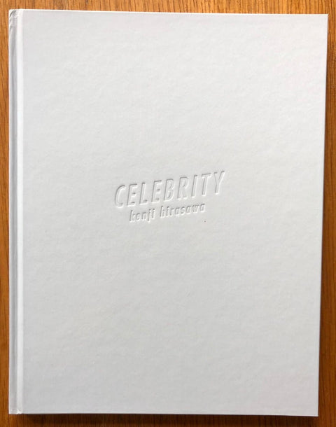 The photography book cover of Celebrity by Kenji Hirasawa. Hardback in white.