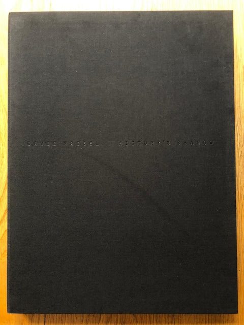 The photography book cover of History's Shadow by David Maisel. Hardback in black. House in clamshell case. Signed.