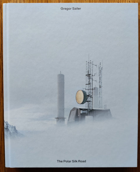 The photography book cover of The Polar Silk Road by Gregor Sailer. In hardcover blue.